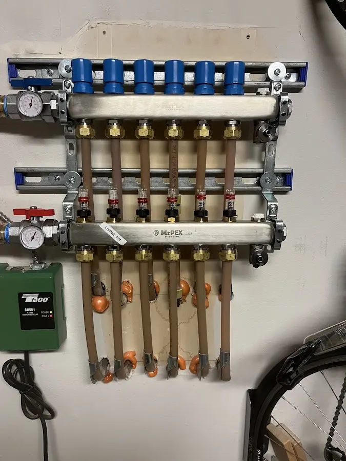 Plumber performing Gas Line Installation at a residential property in Louisville