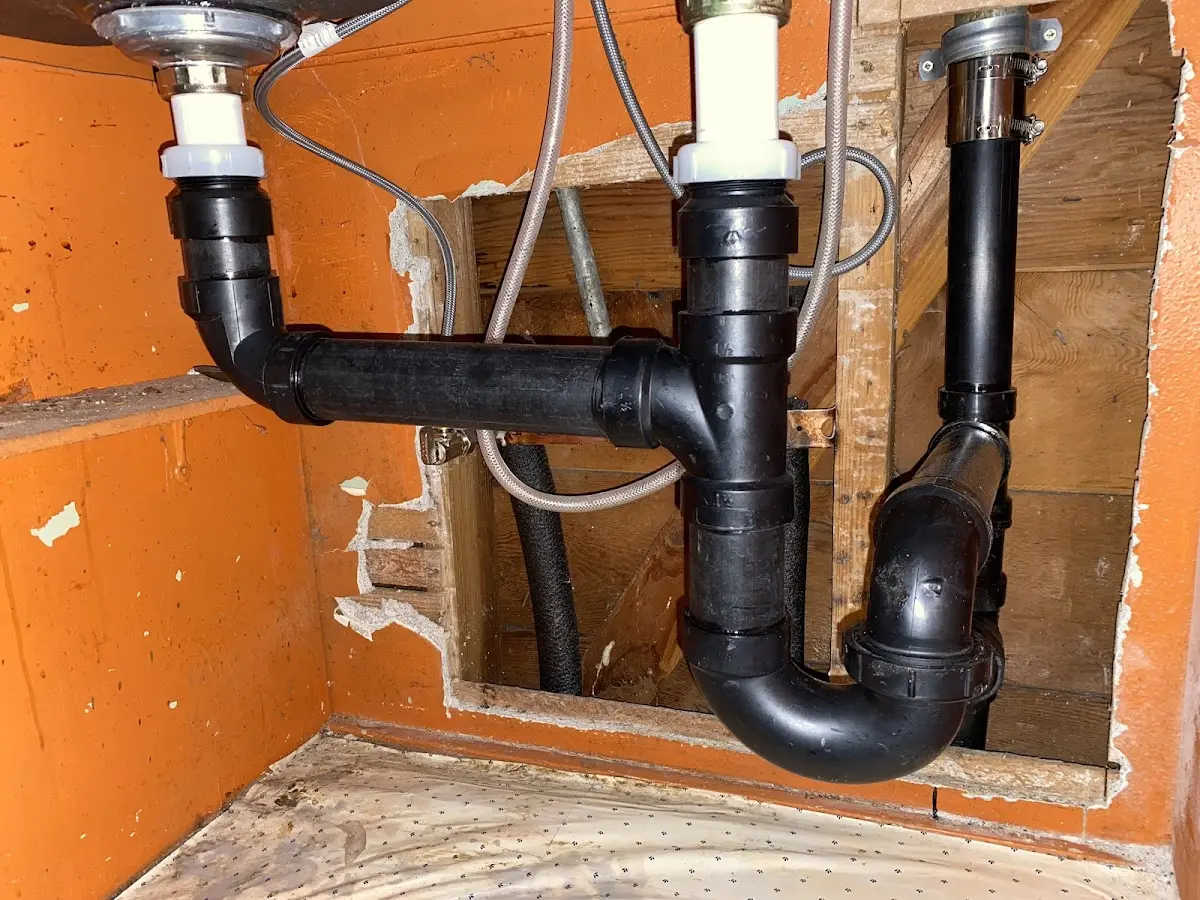 Professional Garbage Disposal Repair equipment and tools on the job in Louisville